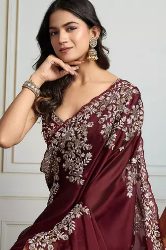Maroon ethnic motif embroidered saree