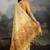 Yellow floral embroidered pure cotton designer muga saree