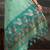 Sea green floral pure cotton designer muga saree