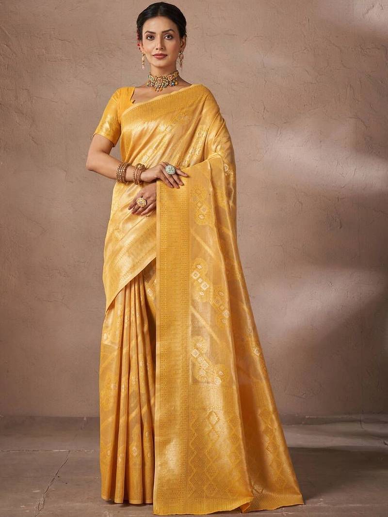 Yellow woven design banarasi sarees with blouse piece