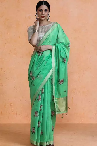Green woven design saree with blouse
