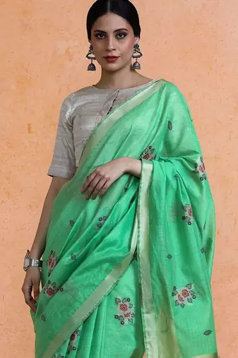 Green woven design saree with blouse