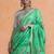 Green woven design saree with blouse