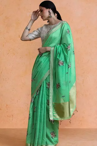 Green woven design saree with blouse