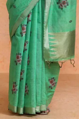 Green woven design saree with blouse