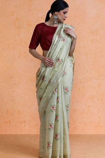 Cream woven design saree with blouse