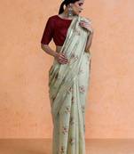 Cream woven design saree with blouse