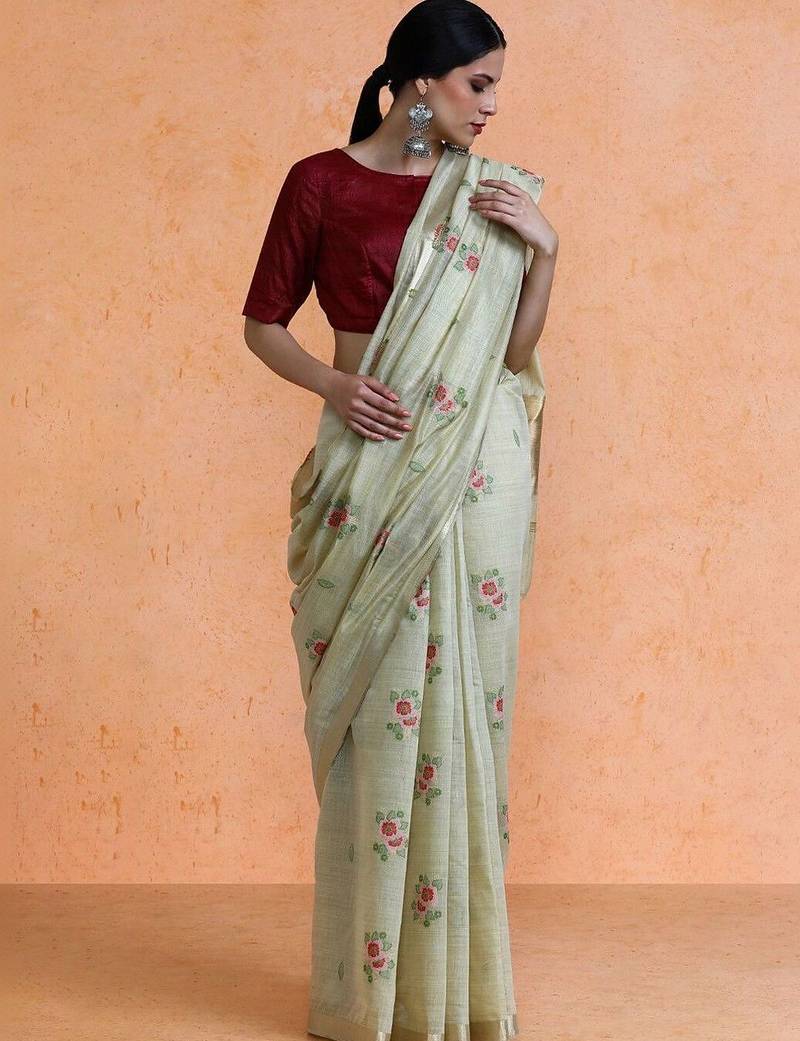 Cream woven design saree with blouse