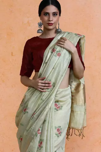 Cream woven design saree with blouse
