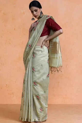 Cream woven design saree with blouse