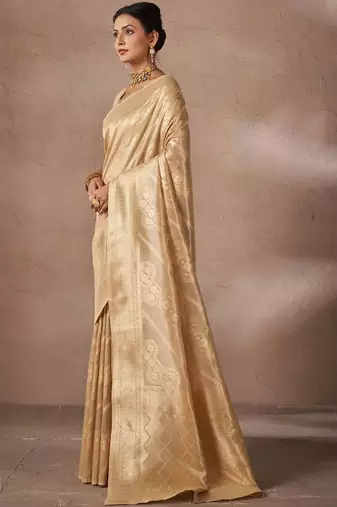 Beige woven design sarees with blouse piece
