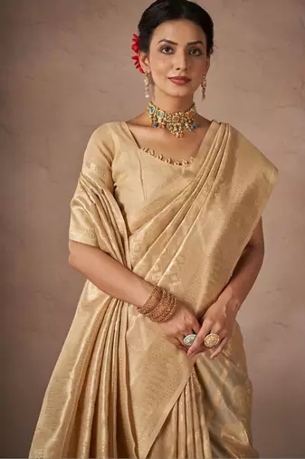 Beige woven design sarees with blouse piece