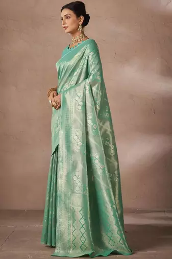 Green woven design sarees with blouse piece