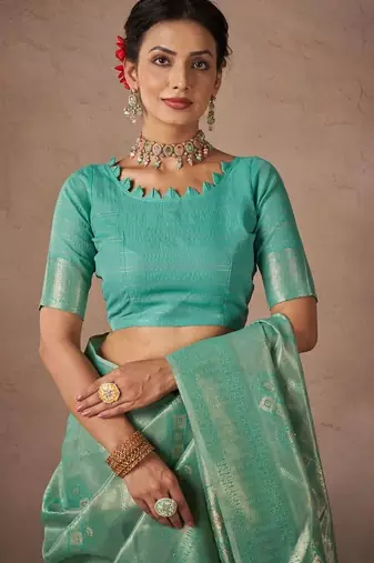 Green woven design sarees with blouse piece