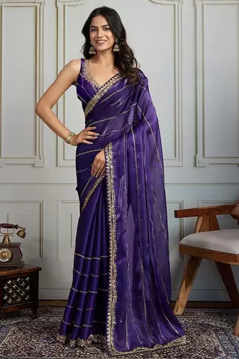 Purple striped sequinned saree with with embroidered border & stitched blouse