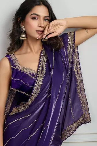 Purple striped sequinned saree with with embroidered border & stitched blouse