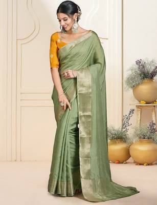 Green ethnic woven design zari saree 1