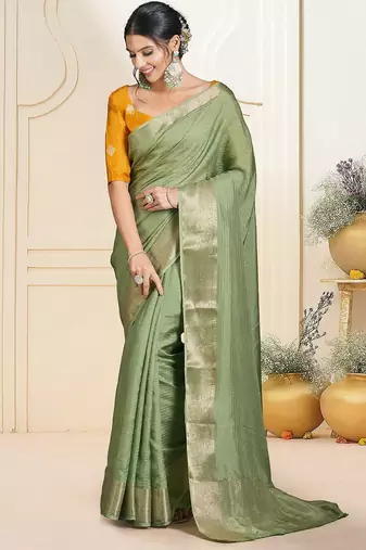 Green ethnic woven design zari saree
