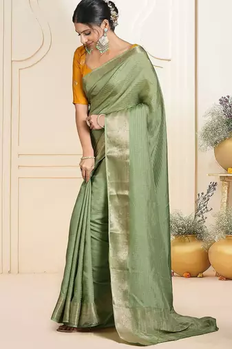Green ethnic woven design zari saree