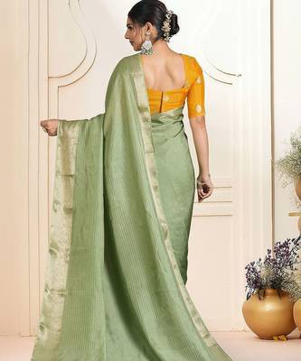 Green ethnic woven design zari saree 3