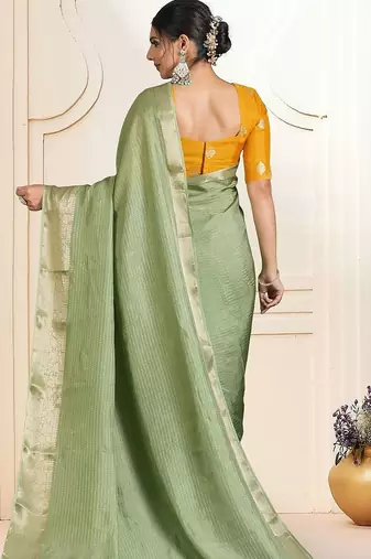 Green ethnic woven design zari saree