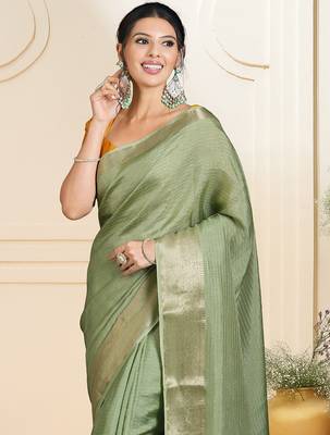 Green ethnic woven design zari saree 4