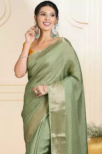 Green ethnic woven design zari saree
