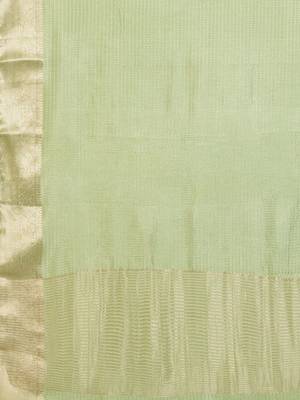 Green ethnic woven design zari saree 5