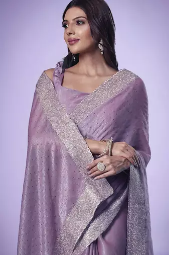 Mauve women embroidered beads and stones saree