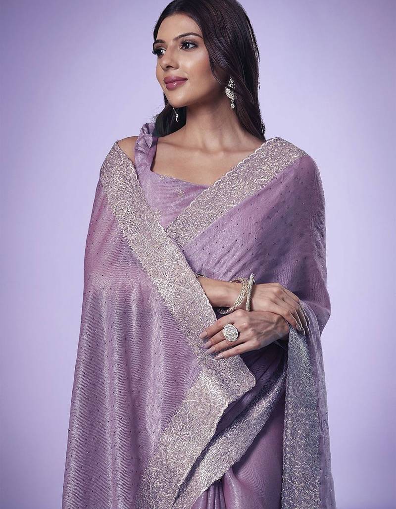 Mauve women embroidered beads and stones saree
