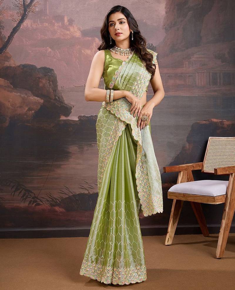 Olive embroidered saree with blouse piece