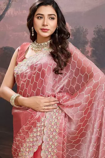 Peach women pastels embroidered saree
