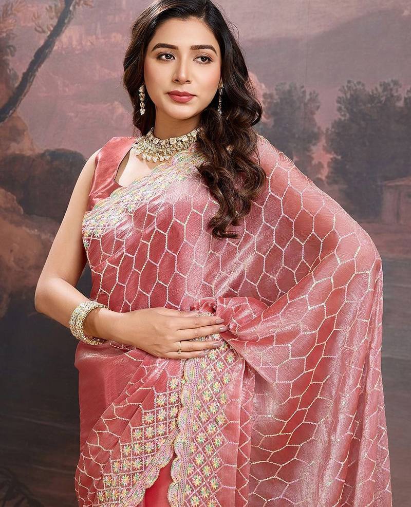 Peach women pastels embroidered saree