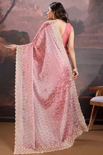 Peach women pastels embroidered saree
