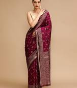 Maroon woven design banarasi saree with unstitched blouse