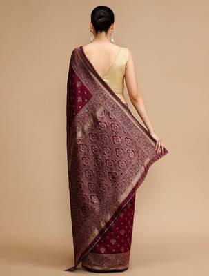 Maroon woven design banarasi saree with unstitched blouse 4