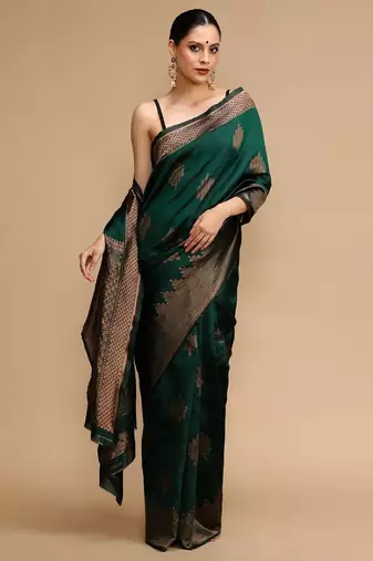 Green ethnic motifs woven design zari banarasi saree
