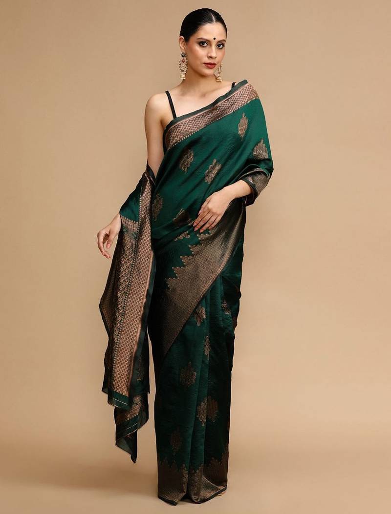 Green ethnic motifs woven design zari banarasi saree