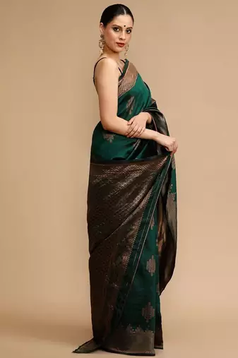 Green ethnic motifs woven design zari banarasi saree