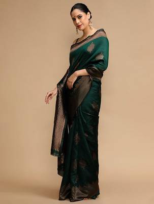 Green ethnic motifs woven design zari banarasi saree 3
