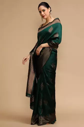 Green ethnic motifs woven design zari banarasi saree
