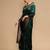 Green ethnic motifs woven design zari banarasi saree