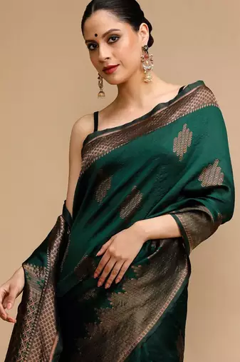 Green ethnic motifs woven design zari banarasi saree