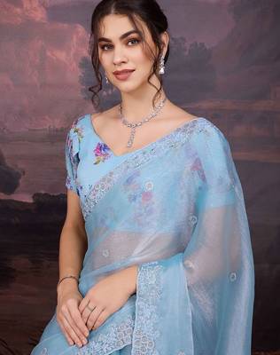 Turquoise embellished embroidered saree 1