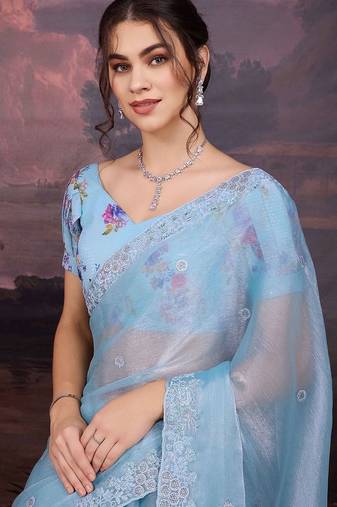Turquoise embellished embroidered saree