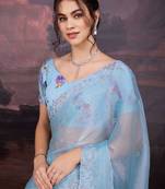 Turquoise embellished embroidered saree
