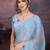 Turquoise embellished embroidered saree