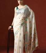 Cream woven design saree with blouse