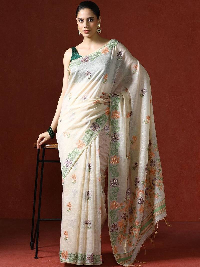 Cream woven design saree with blouse