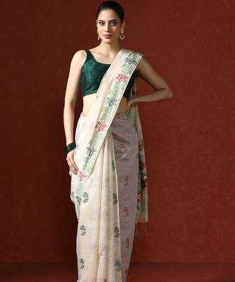 Cream woven design saree with blouse 1